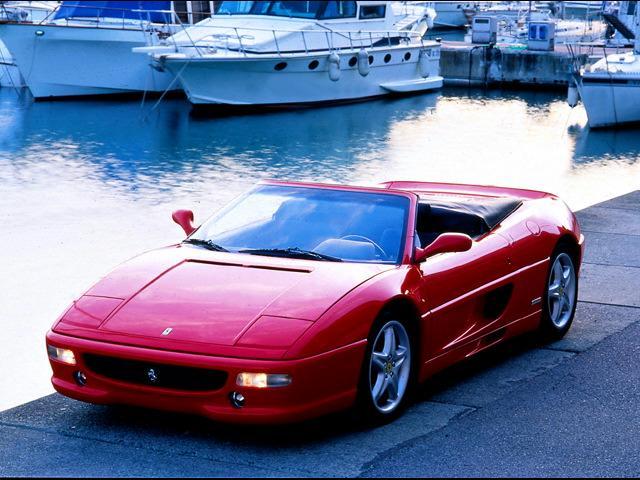 tapety na komurke i nie tylko - Wallpaper Ferrari - f355 rouge - bors de leau.jpg
