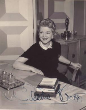 Oscars at home - 1948 Claire Trevor with her Oscar for Key Largo at home.jpg